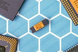 Microchip in the middle of blue hexagon patterns