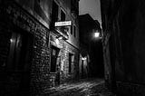 a dark and narrow alleyway