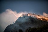 A wildfire on a mountain.