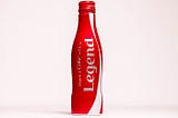 Special Edition Of A Coca Cola Bottle With Word Legend Written On It.