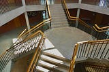 Stairs going up and down in multiple directions connoting choices
