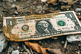 Cash is dying. Are you prepared? US banknote lying on the floor like a piece of trash. AI image created on MidJourney V6 by Henrique Centieiro and bee lee