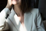 Women in white blazer