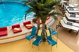 Deck chairs around a pool