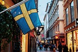 Swedish flag outside a restaurant in Stockholm, Sweden.