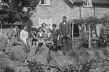 Family Portraits outside an English Home