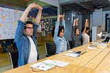 Image of employees participating in workplace wellness activities.