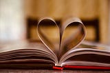 Book with two pages making the shape of a heart