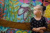 sad little girl, alone, looking of into the distance