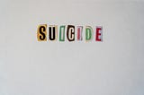 Colorful letters cut from a magazine spell the word suicide. It’s in effect a suicide note.