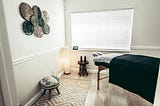 A massage table in a room