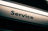 The image shows a sign with the word Service. Image credits at the end of the article.