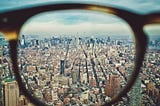 skyscrapers through corrective lenses