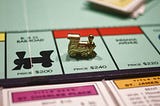 Close up photo of a Monopoly game board.