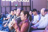 Erika Bell front row at Sydney’s first Google Cloud Summit, capturing Australia’s first GCP partner on stage with NewsCorp and Monash University. Photo credit: Ryan Farrow.