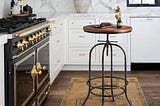 lokkhan-industrial-bar-table-37-4-inch-45-3-inch-tall-swivel-adjustable-bar-height-bistro-pub-table--1