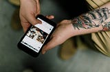 Image of a person reading a Pinterest recipe on his phone.