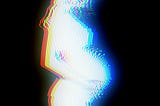 Fuzzy digitized picture of a pregnant woman’s side profile, cradling her belly