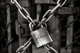 An image of a padlock with chains