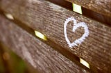love heart painted on fence