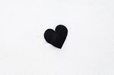 Black heart on a white background.