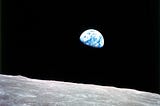 A photo of the Earth viewed from the moon.