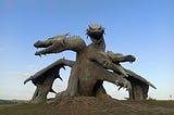 image of a statue of a three-headed dragon