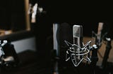 Image of a microphone in a recording studio