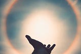 hand reaching up in worship — showing values