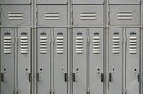 A lot of gray lockers.