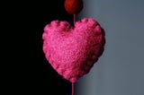 Part of a lovely wool felt string of hearts.