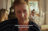 Ed Norton as Miles, saying ‘nobody wants you to break the system itself’