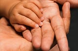 hand in hands (parents and child)