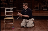 Will Ferrell being a cat playing with cat toys