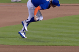 Mets second basemen Jeff McNeil makes an off balance cross body throw to record an out against New York Yankees 7.26.22