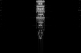 A series of synthetic aperture radar images of a cargo ship at varying angles taken from a satellite. The video tries to demonstrate the versatility of synthetic data generation as opposed to trying to gather these images from measured sources.