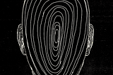 An animated GIF having spiralling lines within the human head.