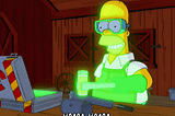 Homer Simpson lifting a glowing test tube saying , “Hmm Hmm.”