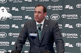 A cartoon ghost floating around Jets coach Adam Gase