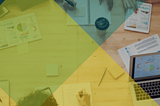 A GIF of an office workspace image with UX Research being typed.