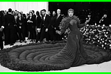 A gif flashng the looks of previous Met Gala outfits. Stars such as Katy Perry, Harry Styles and Ariana Grande can be recognised.