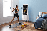 Animated gif showing a woman working out with a virtual trainer