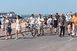 Chandy and Gordon walking on Bournemouth promenade