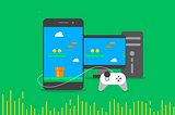 GIF of phone and computer with game playing on screen. Green background