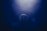 A microphone in the dark.