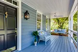 This is a classic Southern porch painted in “Haint Blue”.