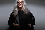 Beautiful older lady with long grey hair