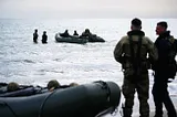 Photo of a few Royal Marines in training via Alt text on Medium