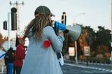 Woman with a megaphone.