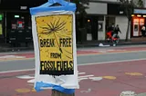 White and yellow plastic pack. Climate awareness pamphlet in San Francisco, 2018.